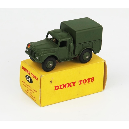 2256 - A Dinky Toys 641 Army 1 Ton Cargo Truck with driver, no windows in non-picture. Very near mint  in e... 