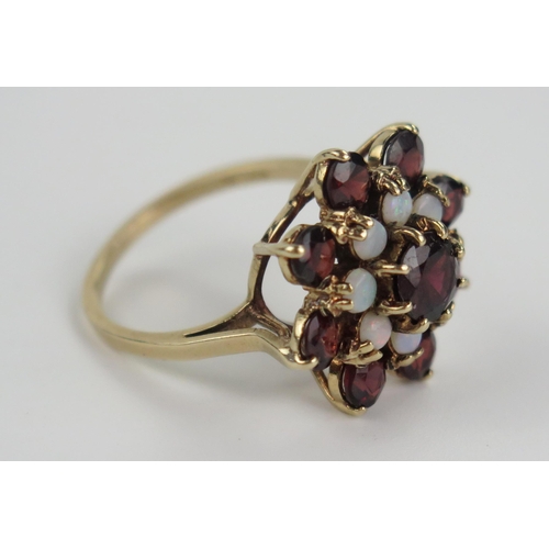 226 - 9ct Gold, Garnet and Opal Cluster Ring, 20mm head, size O.5, 5.1g