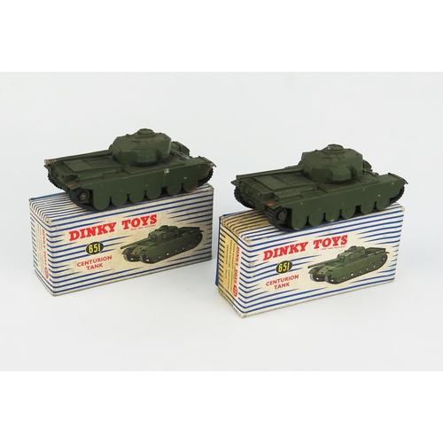 2260 - Two Dinky Toys 651 Centurion Tanks with metal rollers with blue/white stripe boxes. Both with rust i... 