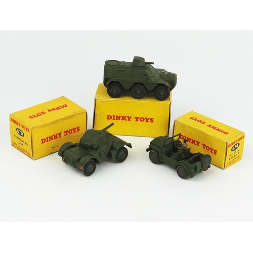 2265 - Three  Dinky Toys Army Vehicles all in early non-picture boxes - 670 Armoured Car, 674 Austin Champ ... 