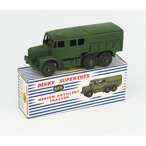 2269 - A Dinky Supertoys Medium Artillery Tractor with driver in blue/white stripe box. Excellent, rust to ... 