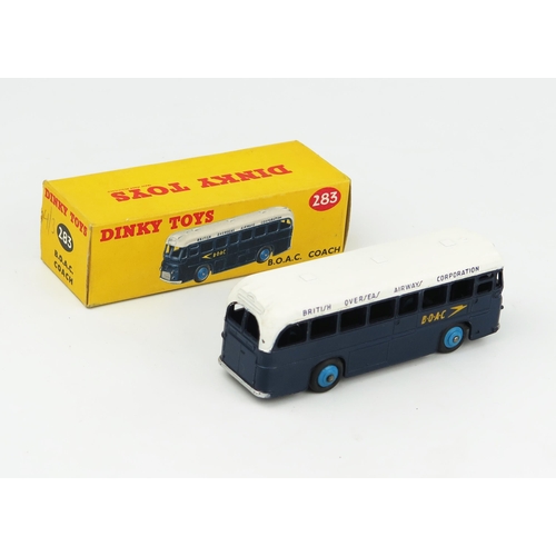 2278 - A Dinky 283 BOAC Coach in dark blue/white with blue hubs and black smooth tyres. Near mint in near m... 