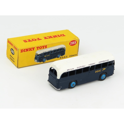 2279 - A Dinky 283 BOAC Coach in dark blue/white with blue hubs and black smooth tyres. Near mint in excell... 