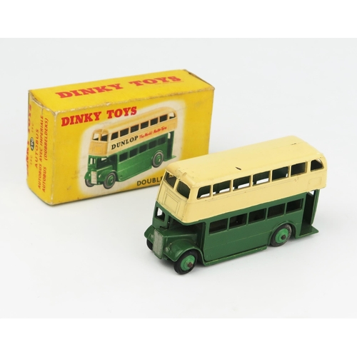 2280 - A Dinky Toys 29c 290 Double Deck Bus with Type 2 AEC grille, dark green/cream with green hubs and no... 