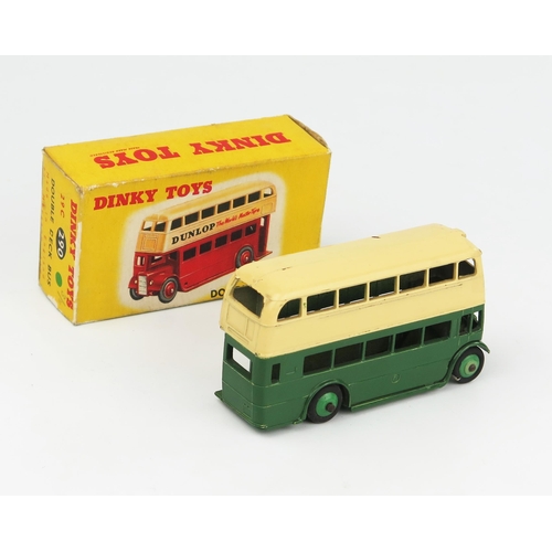 2280 - A Dinky Toys 29c 290 Double Deck Bus with Type 2 AEC grille, dark green/cream with green hubs and no... 