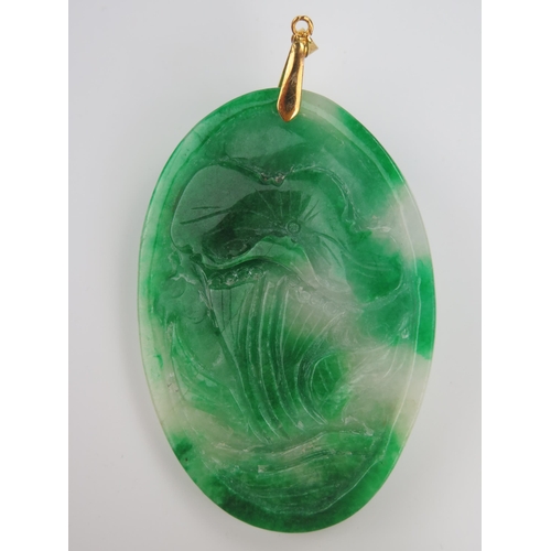 229 - Large Chinese Jadeite Pendant decorated with a fish  and flower to the reverse, stone 84x57mm, 107g