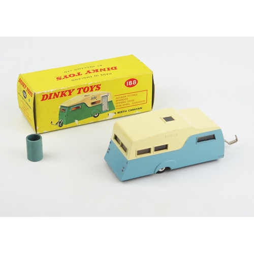 2293 - A Dinky Toys 188 Four Berth Caravan in blue/cream with spun hubs in light yellow picture box with co... 