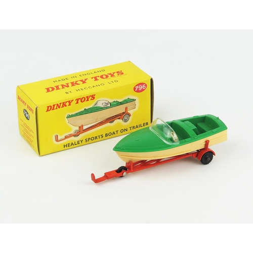 2302 - A Dinky Toys 796 Healey Sports Boat on Trailer in green with cream hull and orange trailer. Near min... 