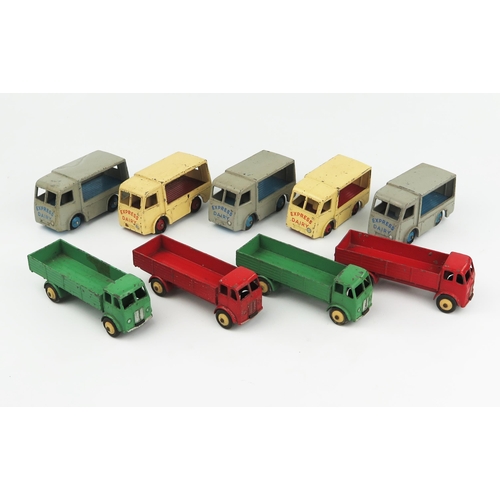 2306 - Four Dinky Toys 25R Forward Control Lorries - two in green with cream hubs, two in red with cream hu... 