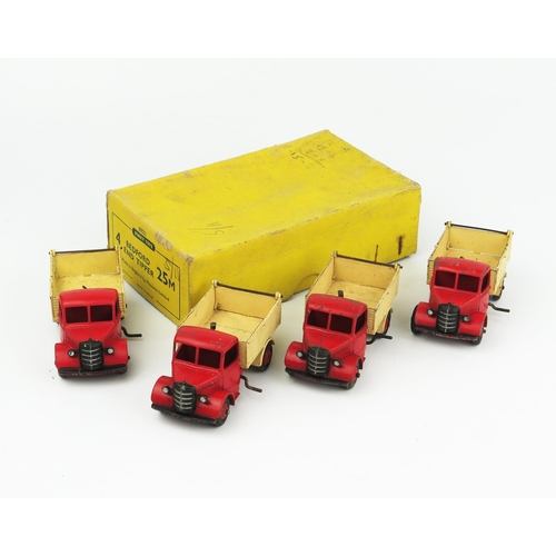 2307 - A Dinky Toys 25M (50021) Bedford End Tipper Type 4 Yellow Trade Box complete with four models of the... 