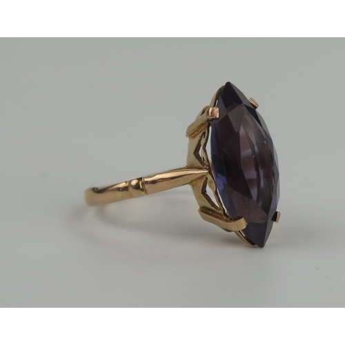 231 - Alexandrite Marquise Cut Ring in an Egyptian gold setting, the 20x10mm stone with a good range of co... 