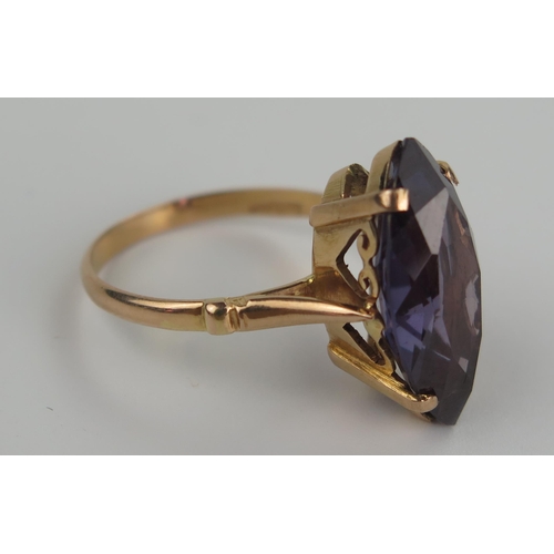 231 - Alexandrite Marquise Cut Ring in an Egyptian gold setting, the 20x10mm stone with a good range of co... 