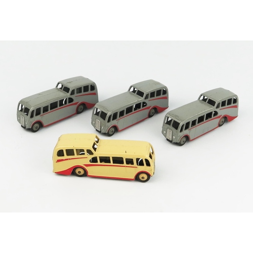 2312 - Four Dinky Toys 29f Observation Coaches - three with grey body and hubs, red flashes, one with cream... 