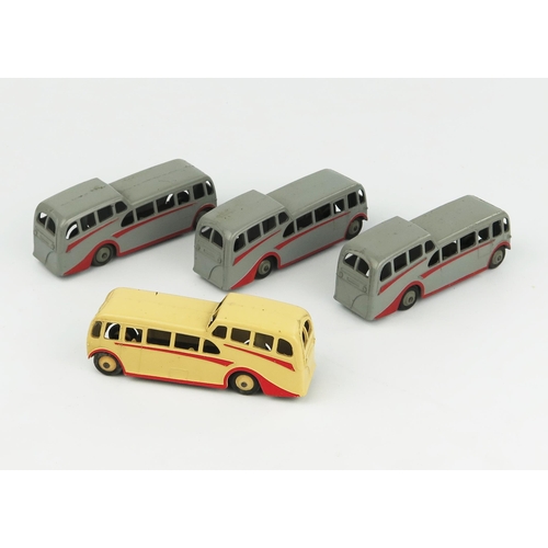 2312 - Four Dinky Toys 29f Observation Coaches - three with grey body and hubs, red flashes, one with cream... 