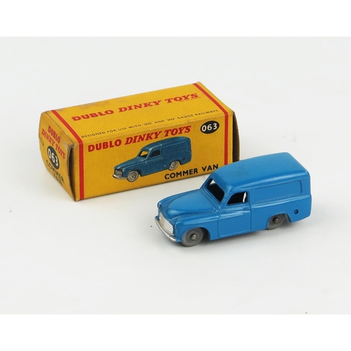 2344 - A Dublo Dinky Toys 063 Commer Van in blue with silver trim and smooth grey wheels. Very near mint in... 