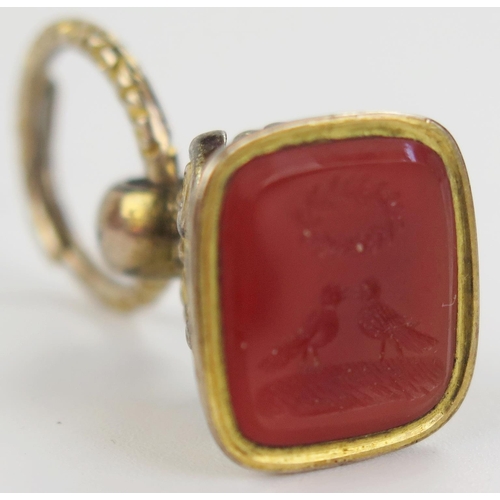 24 - Georgian Gold Jump Ring (15mm diam.) and gold plated  seal with orange agate matrix decorated with a... 