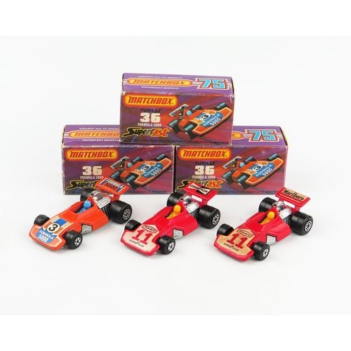 2412 - Matchbox Superfast 36c Formula 5000 trio - all with 5 spoke front wheels, Maltese cross rear wheels ... 