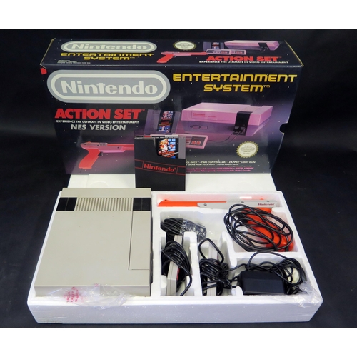 2604 - Nintendo NES Entertainment System Action Set - comes with orange zapper, two controllers, and Mario ... 