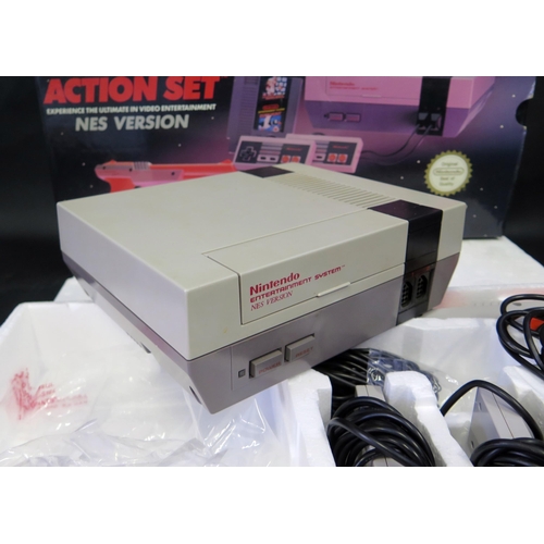 2604 - Nintendo NES Entertainment System Action Set - comes with orange zapper, two controllers, and Mario ... 