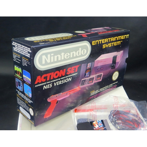 2604 - Nintendo NES Entertainment System Action Set - comes with orange zapper, two controllers, and Mario ... 