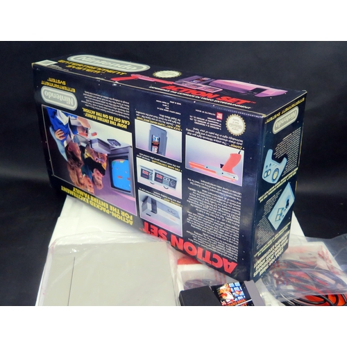 2604 - Nintendo NES Entertainment System Action Set - comes with orange zapper, two controllers, and Mario ... 