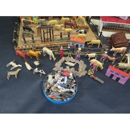 2613 - A Collection of Mainly Wooden Farm Buildings, Animals and accessories, some lead figures, some plast... 