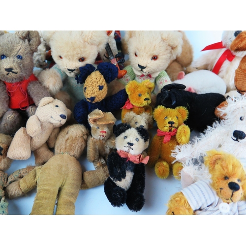 2623 - A Collection of Vintage Small and Miniature Teddy Bears, Pandas, clockwork dog, rabbits etc. (smalle... 