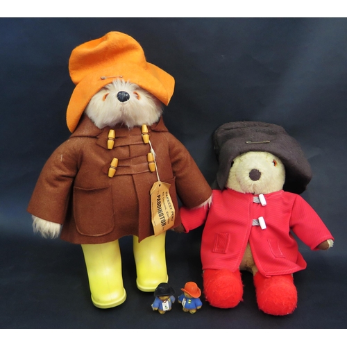 2624 - Paddington Bear Group including Gabrielle Designs with orange hat, brown coat and yellow boots, anot... 