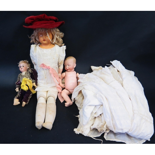 2632 - Three Vintage Dolls with a quantity of spare dresses (tallest 57cm), The unclothed Doll is stamped K... 