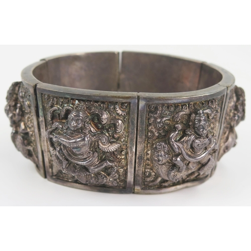 296 - 19th Century Indian Unmarked Silver Bangle decorated with Hindu figures, 35mm wide, 85g