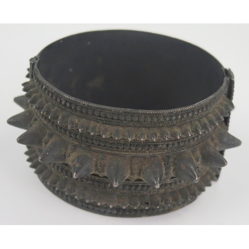 298 - Nineteenth Century Indian Silver Hinged Spike Bangle, 36mm wide, 54x48mm inside dimensions, 52g. Pin... 