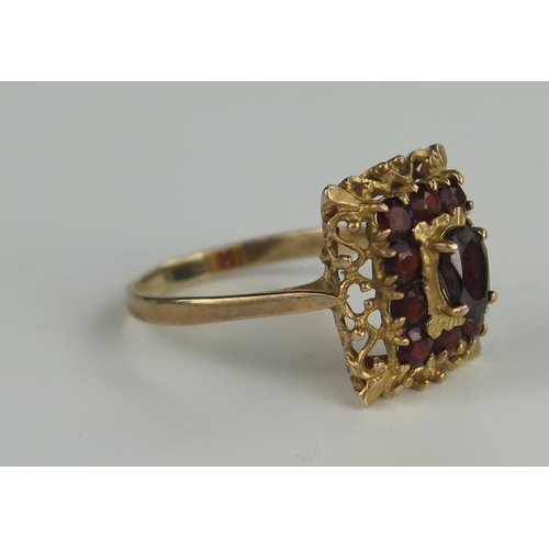 405 - 9ct Gold and Garnet Cluster Ring, 15x13mm head, size N.5, 2.7g