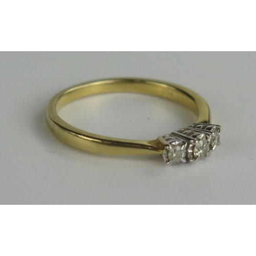 413 - 18ct Gold and Diamond Three Stone Ring, central stone 3mm and flanked by 2mm, size N, 3g