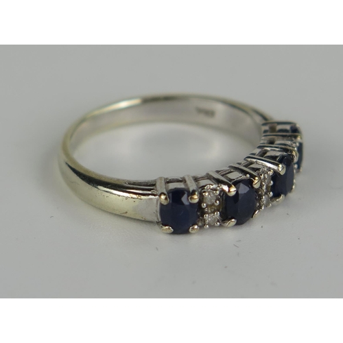 415a - 9ct Gold, Sapphire and Diamond Ring, 18mm head, size L.25, 2.9g