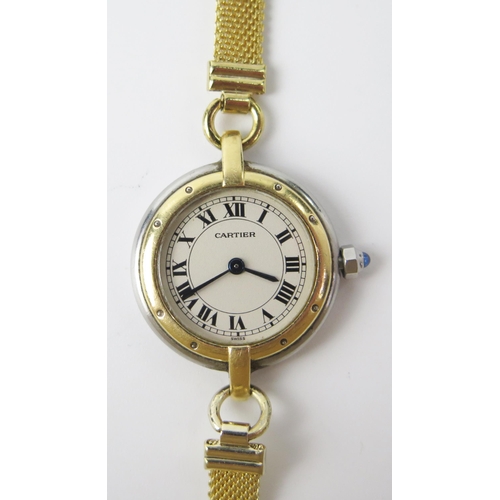 436b - Cartier Ladies Wristwatch, 23.5mm steel and gold case with cabochon sapphire set crown, back marked ... 