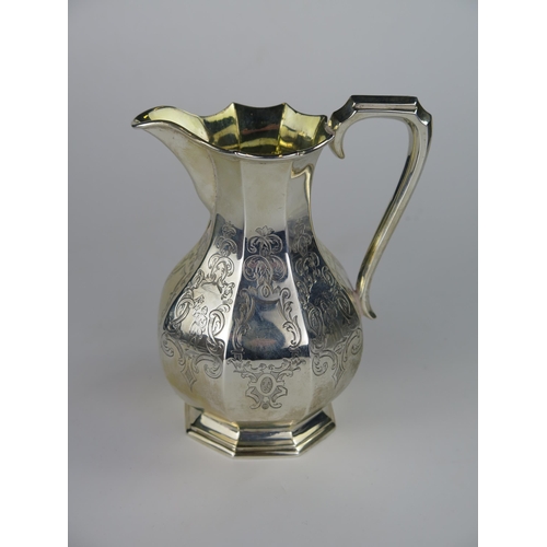 665 - Victorian Silver Milk Jug with chased figural and foliate decoration and gilt lined interior, 13cm h... 