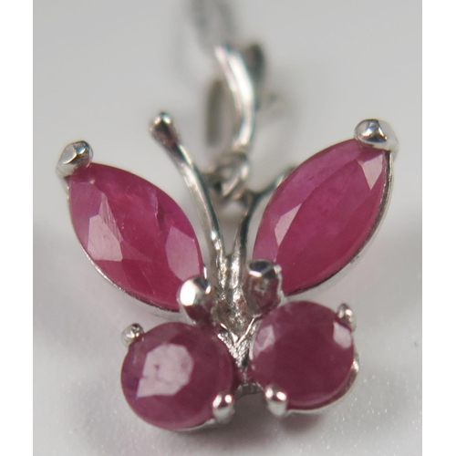 69 - 14ct White Gold and Ruby Butterfly Pendant on a fine 22