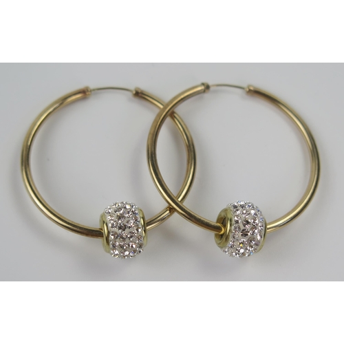 72 - A Pair of 9ct Gold Hoop Earrings decorated with spinning paste loop, 32mm inner diameter, 3.5g