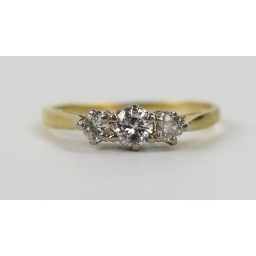 75 - An 18ct Yellow Gold and Diamond Three Stone Ring, principal stone c. 4.2mm, size Q.5