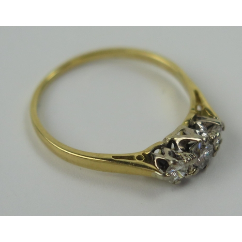 75 - An 18ct Yellow Gold and Diamond Three Stone Ring, principal stone c. 4.2mm, size Q.5