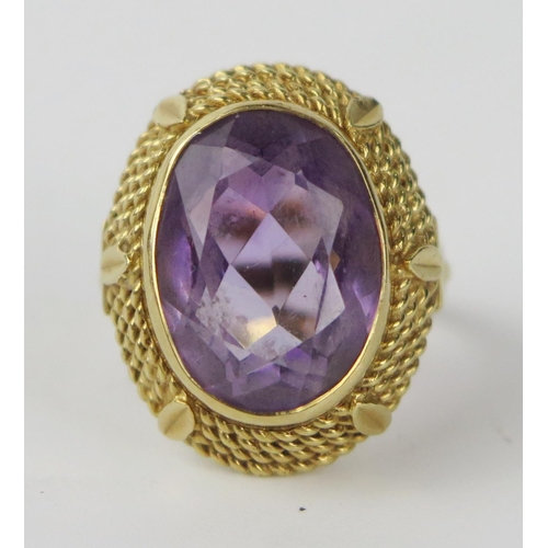 75a - 18ct Gold and Amethyst Dress Ring, size M.5, 22x18mm head, 9.3g