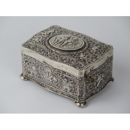 765 - Silver Bird Box Automaton with embossed putti and foliate decoration, c. 11(w)x6(h)x8(d)cm