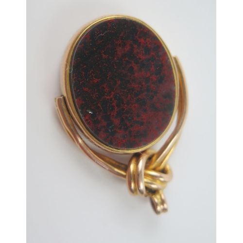 82 - Antique 9ct Gold Spinning Fob set with agate, 34mm drop, Birmingham 1909, 8.4g