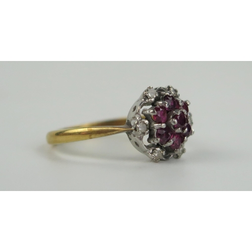 86 - 18ct Gold, Ruby and Diamond Cluster Ring, 12mm diam., size M.5, 4.4g