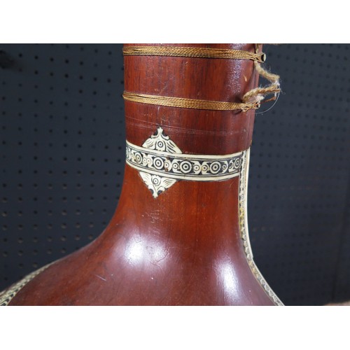 2710 - An Indian Sitar beautifully decorated with bone inlay and carvings - missing two tuning pegs