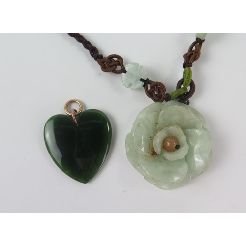 210f - Chinese Carved Jade Flower Pendant (34mm diam.) and nephrite hear pendant