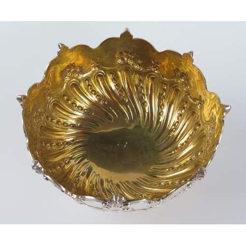 658 - Victorian Silver Monteith or  Punch Bowl with embossed gadrooned and foliate decoration, gilt lined,... 