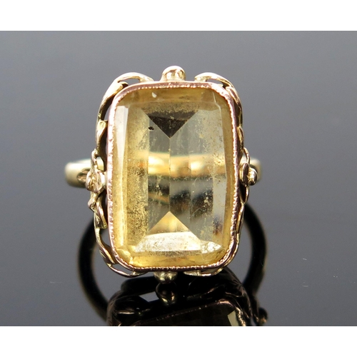 102 - 18ct Gold and Citrine Dress Ring with foliate decorated setting, c. 17x13mm stone, Birmingham 1929, ... 