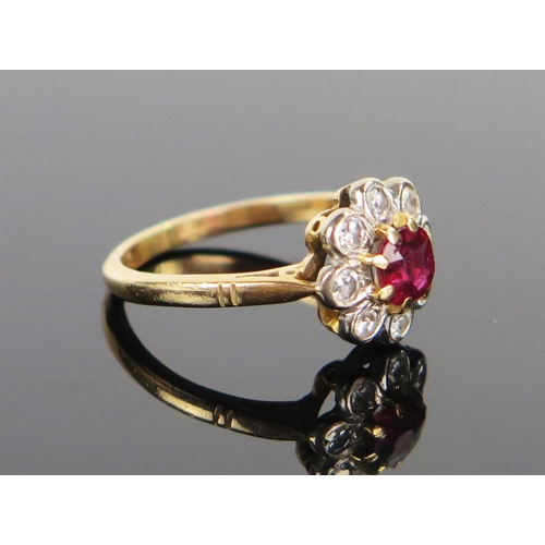 119 - Modern 18ct Gold, Ruby and Diamond Cluster Ring, c. 11mm head, size L.25, 3.3g