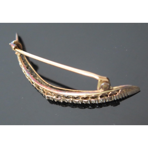 12 - Antique Diamond Crescent Brooch set with fifteen old cut stones, largest estimated at .15ct, 45.5mm ... 